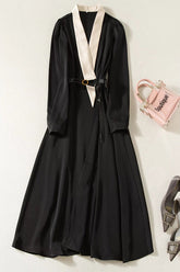 Elegante vestido midi negro de oficina de Kate Middleton